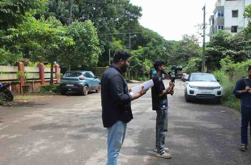 Behind the scenes of a film shoot with a camera crew