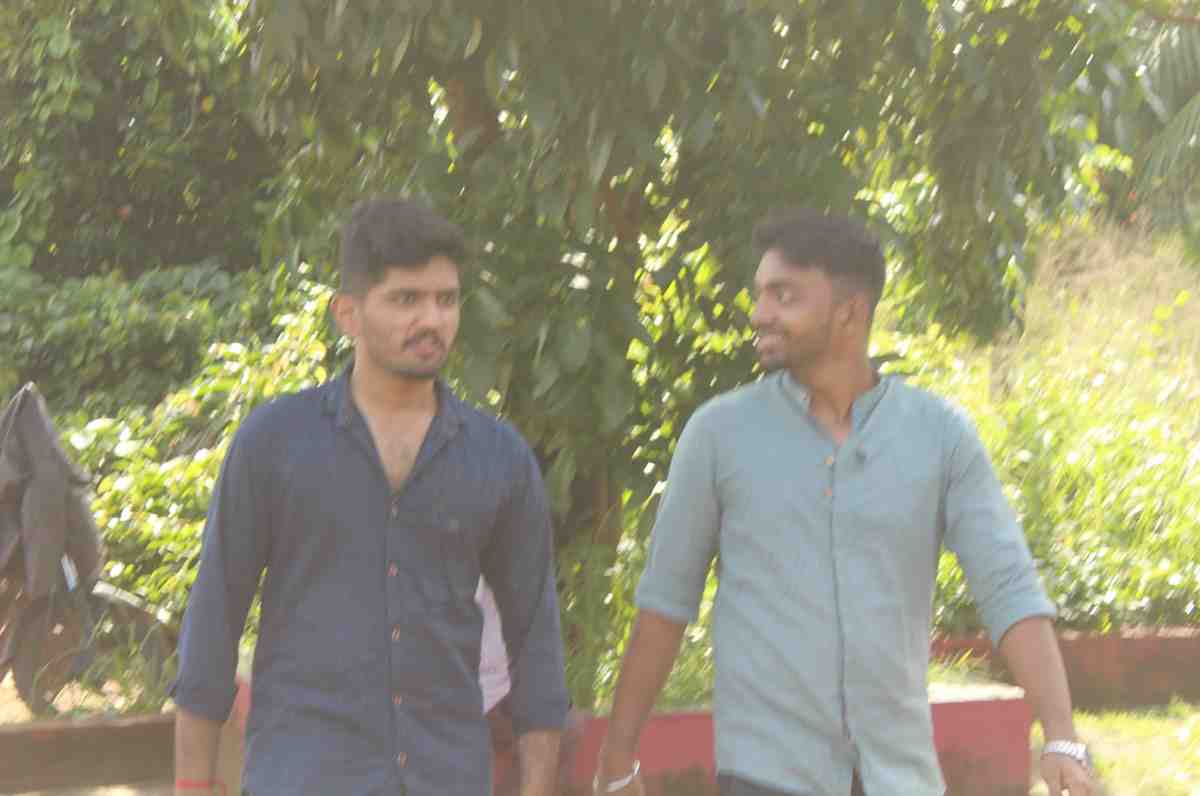 Make-up artist preparing an actor for a scene