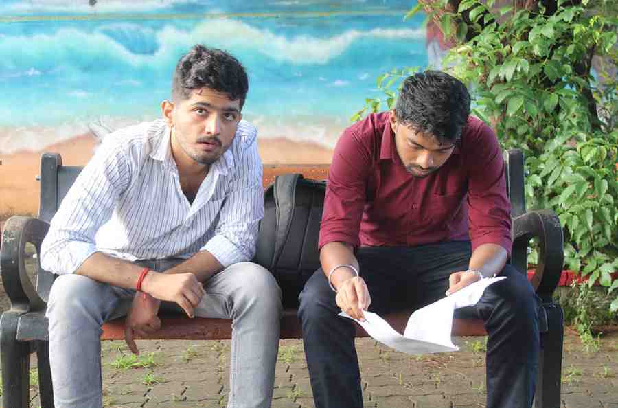 Behind the scenes of a film set with green screen